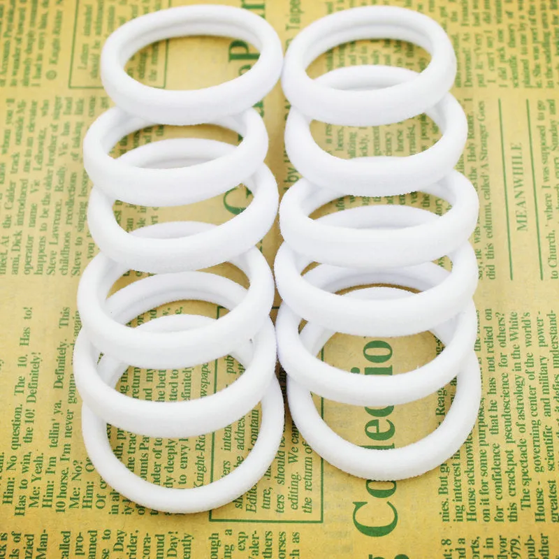 2015 New 50pcs/bag 40mm Pure White Hair Holders Rubber Bands Elastics Girl Women Tie Gum Fashion Free Shipping